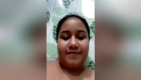 Big boobs amateur brunette showing off on web camera