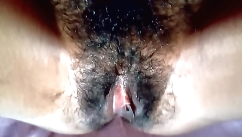 Hairy indian woman masturbates with her large dildo