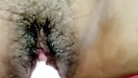 Indian girl in a black bikini gets fucked with a toy