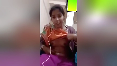 Sexy amateur brunette girl shows her boobies in solo clip