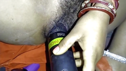 Indian teen is getting a facial and a dildo in her pussy