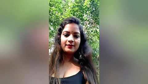 Indian cook is playing with her cooking skills in the kitchen