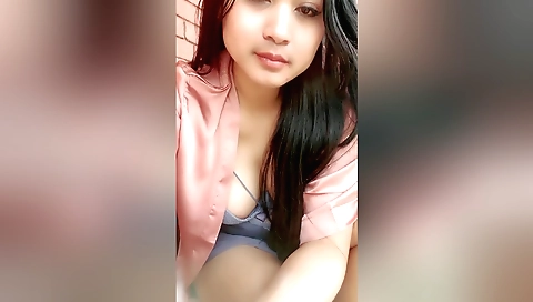 Naked Indian girl in a sexy outfit enjoys her shower
