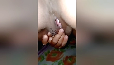 Indian desi wife masturbates in bed on her hairy pussy