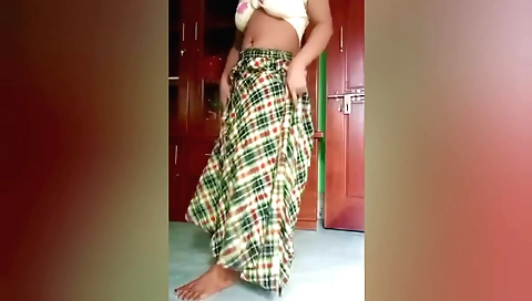 Indian woman stretches her legs in front of the camera
