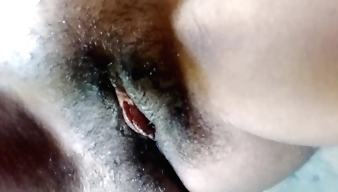 Indian amateur hairy slut seduces a guy in her bedroom