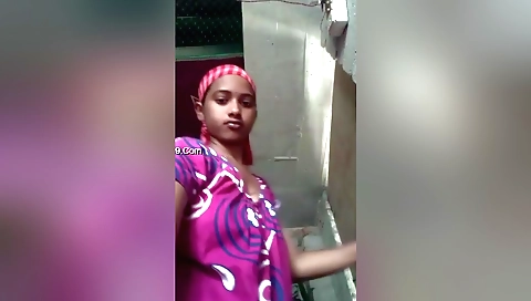 Indian girlfriend wears her outfit in the bedroom 1