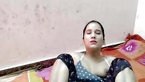 Indian solo movie watching for a brunette in sexy outfit