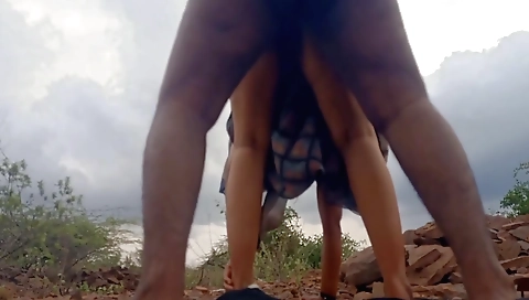 Indian girl with a long blonde hair in an outdoor scene