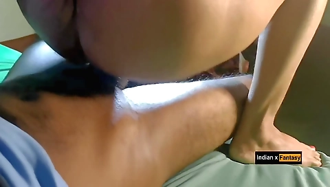 Busty indian brunette gives a blowjob to her boyfriend