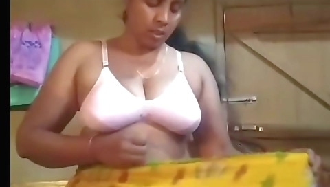 Indian chick with a big ass and big tits on a huge screen