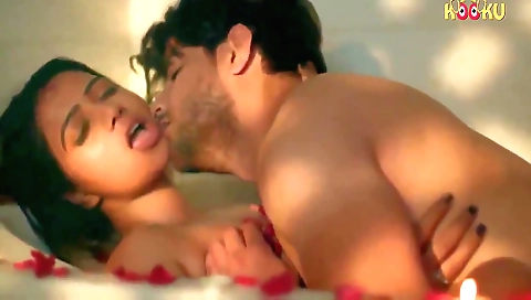 Busty indian babe riding on his cock in the kitchen
