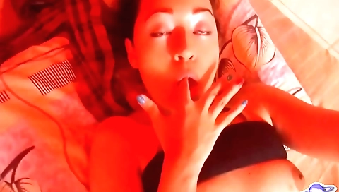 Busty brunette toy masturbation action in red room