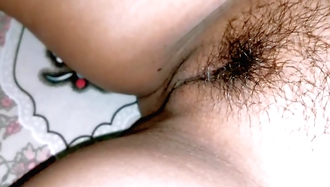 Indian slut gets naked with her boyfriend in the bedroom