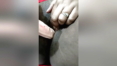 Indian slut takes a dildo in hairy pussy and moans