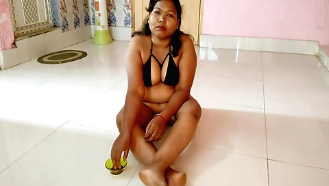 Indian housewife makes her way through her bedroom