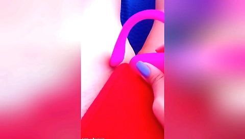 Indian chick playing with her own pink toy in a solo scene