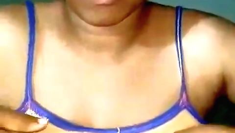 Asian babe with big boobs takes a huge glass of juice