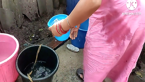 Indian girl gets naked and enjoys the rain outdoors
