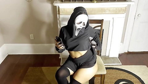 A sexy brunette in stockings shows her nice body in this video