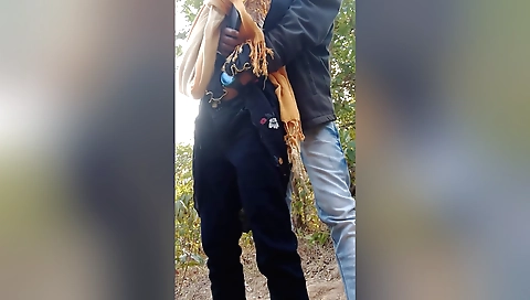 Indian with a big pair of boobs rides on the outdoors