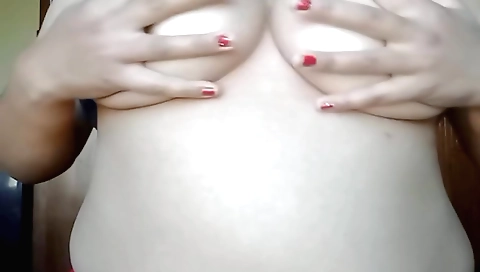 Sexy chick masturbates on a webcam on her nude body