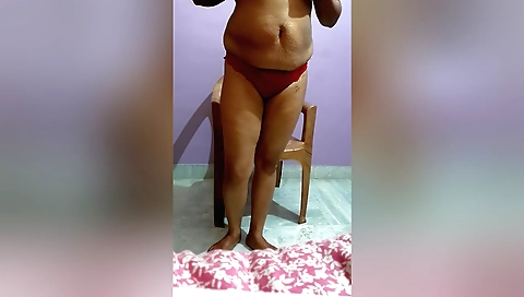 Solo girl with natural tits is masturbating in home