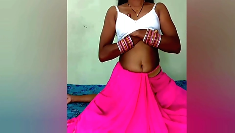 Indian brunette 18+ in a white blouse and shorts and a pink blouse