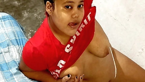 Sexy brunette with huge boobs takes off her clothes