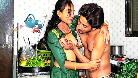 Indian slut plays with her sexy pussy in her kitchen