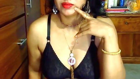 Indian beauty with big tits is naked and naked on camera